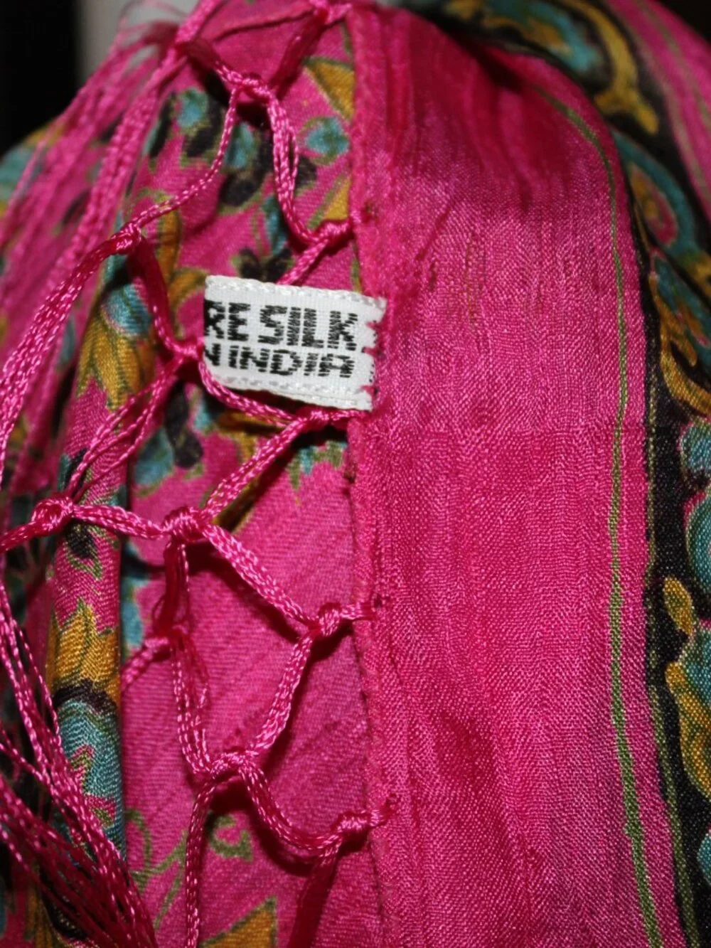 Bright silk scarf.